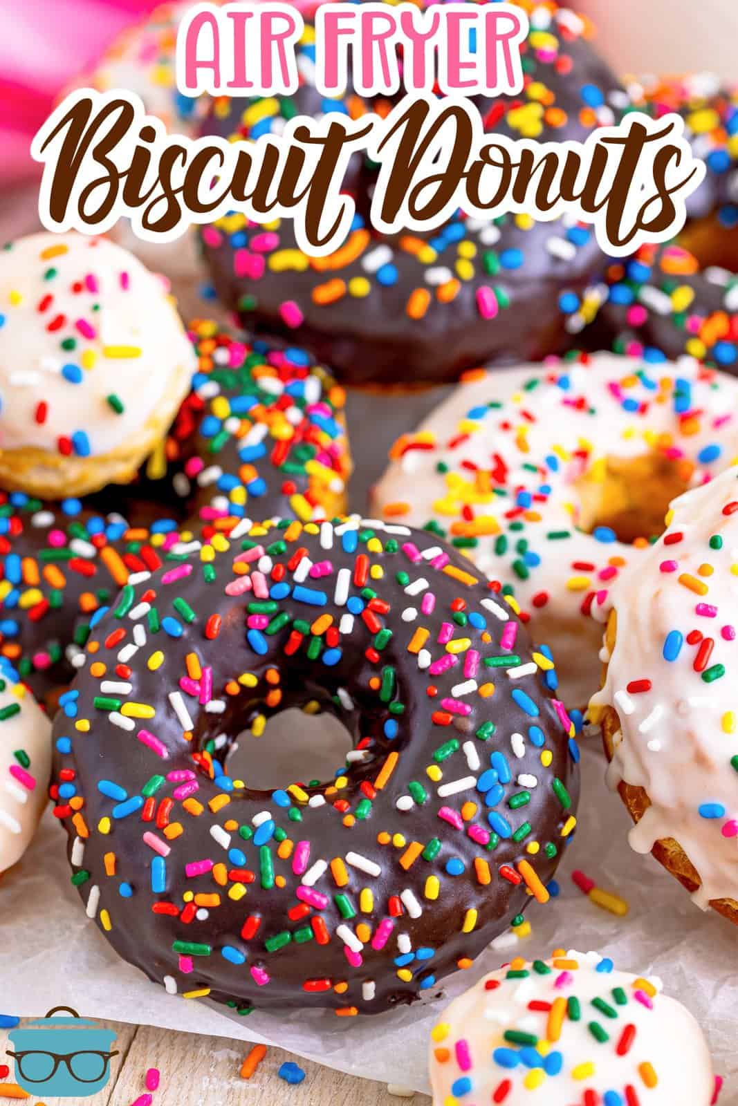 A few homemade donuts with frosting and sprinkles.