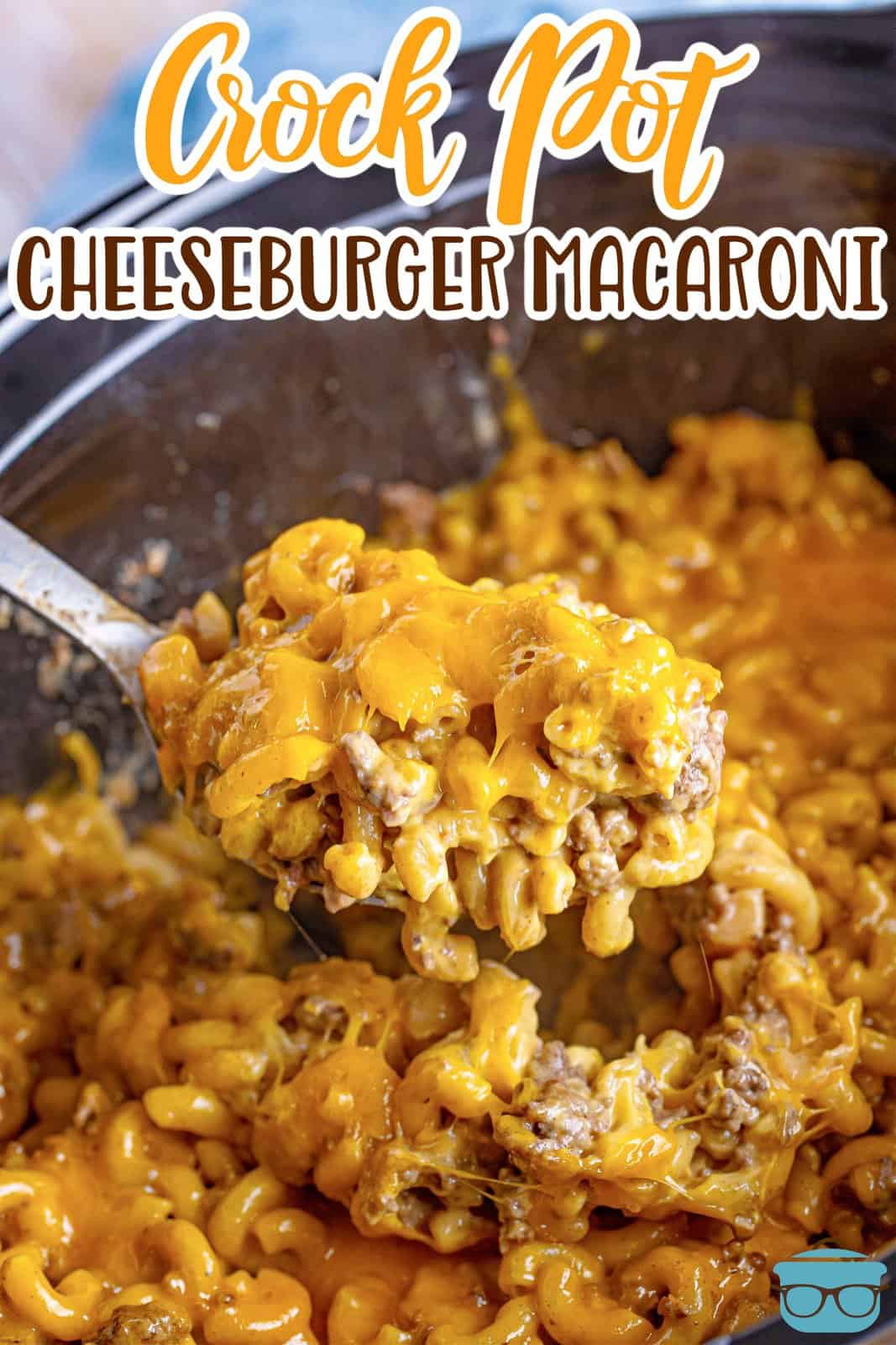 A serving utensil scooping a serving of Cheeseburger Macaroni.