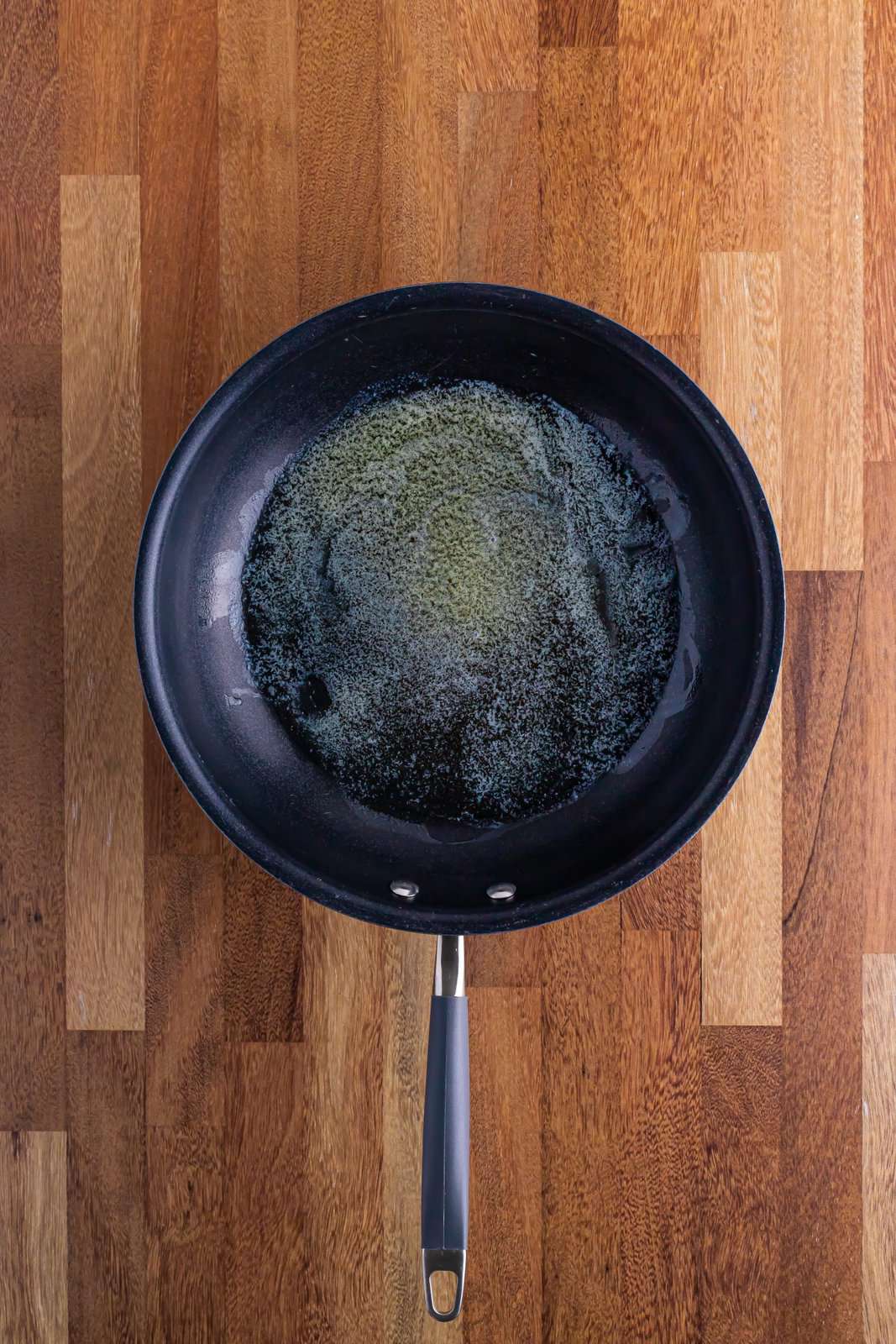 Skillet with melted butter. 