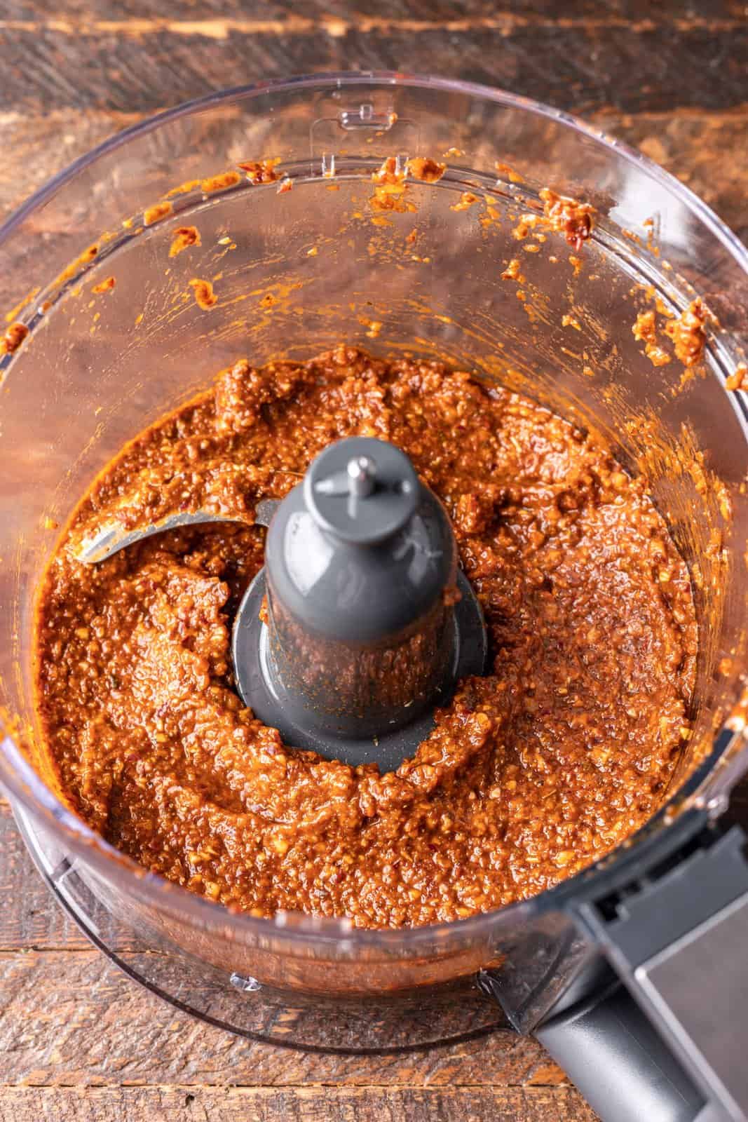 A puree made from all the ingredients in chipotle chicken minus the chicken in a food processor.
