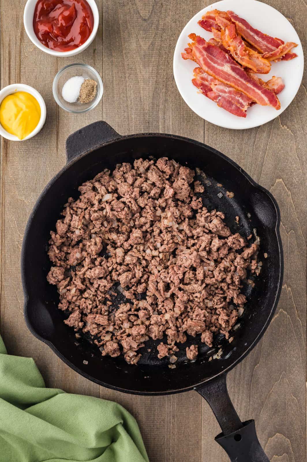 A skillet with ground beef.