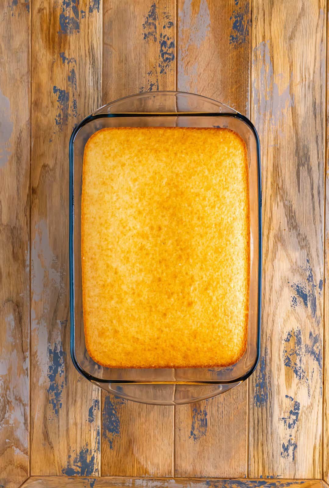 A baked cake in a baking dish.