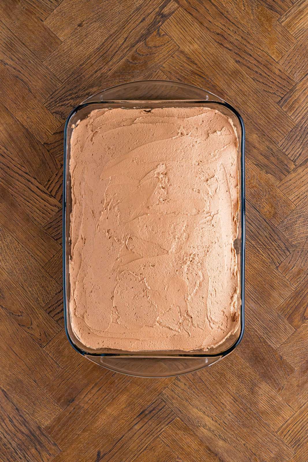 A chocolate cake with chocolate frosting. 