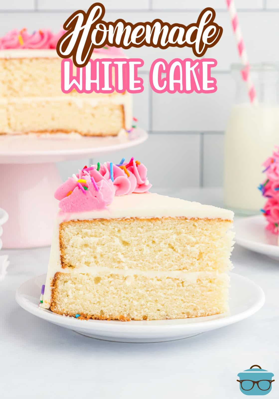 A slice of layered white cake with frosting.