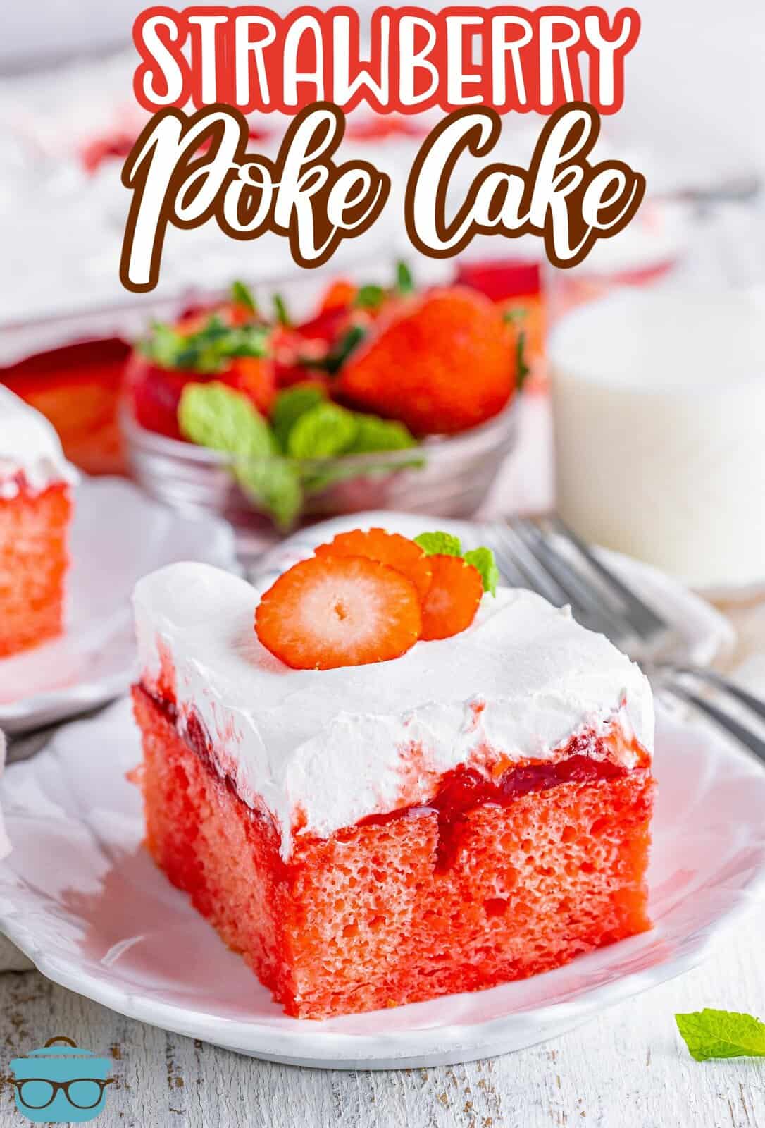 A slice of homemade strawberry poke cake sitting on a white plate.