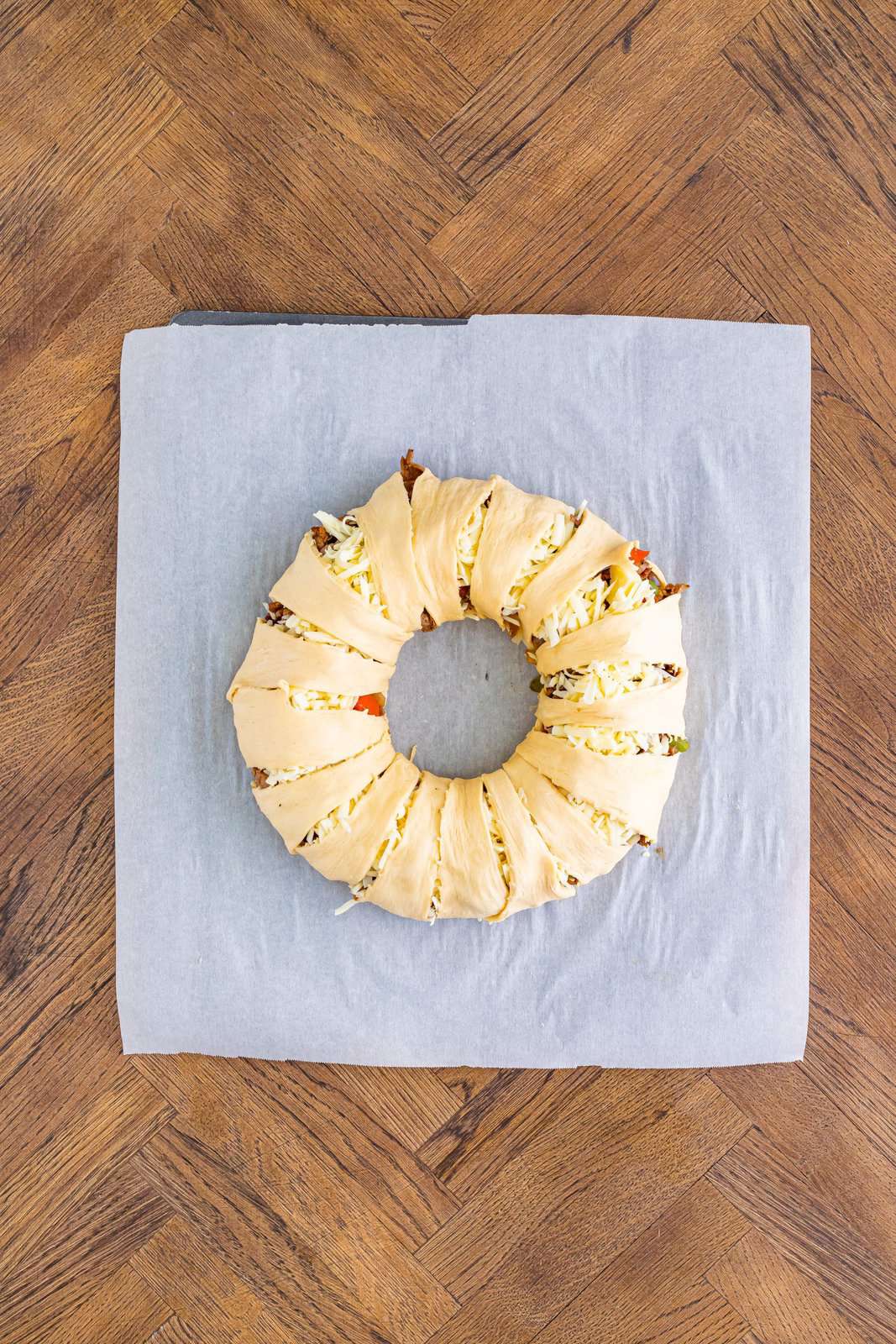 A rolled up Cheesesteak Crescent ring.