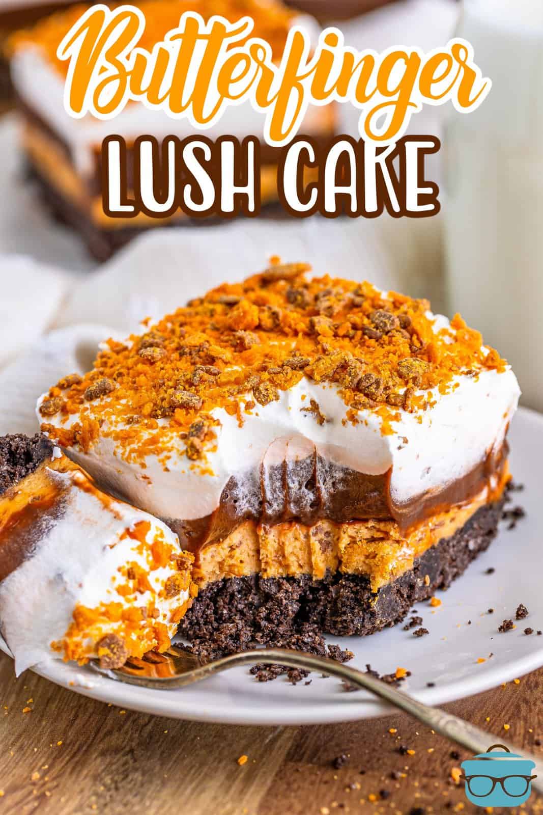 A slice of Butterfinger Lush with a bite missing.
