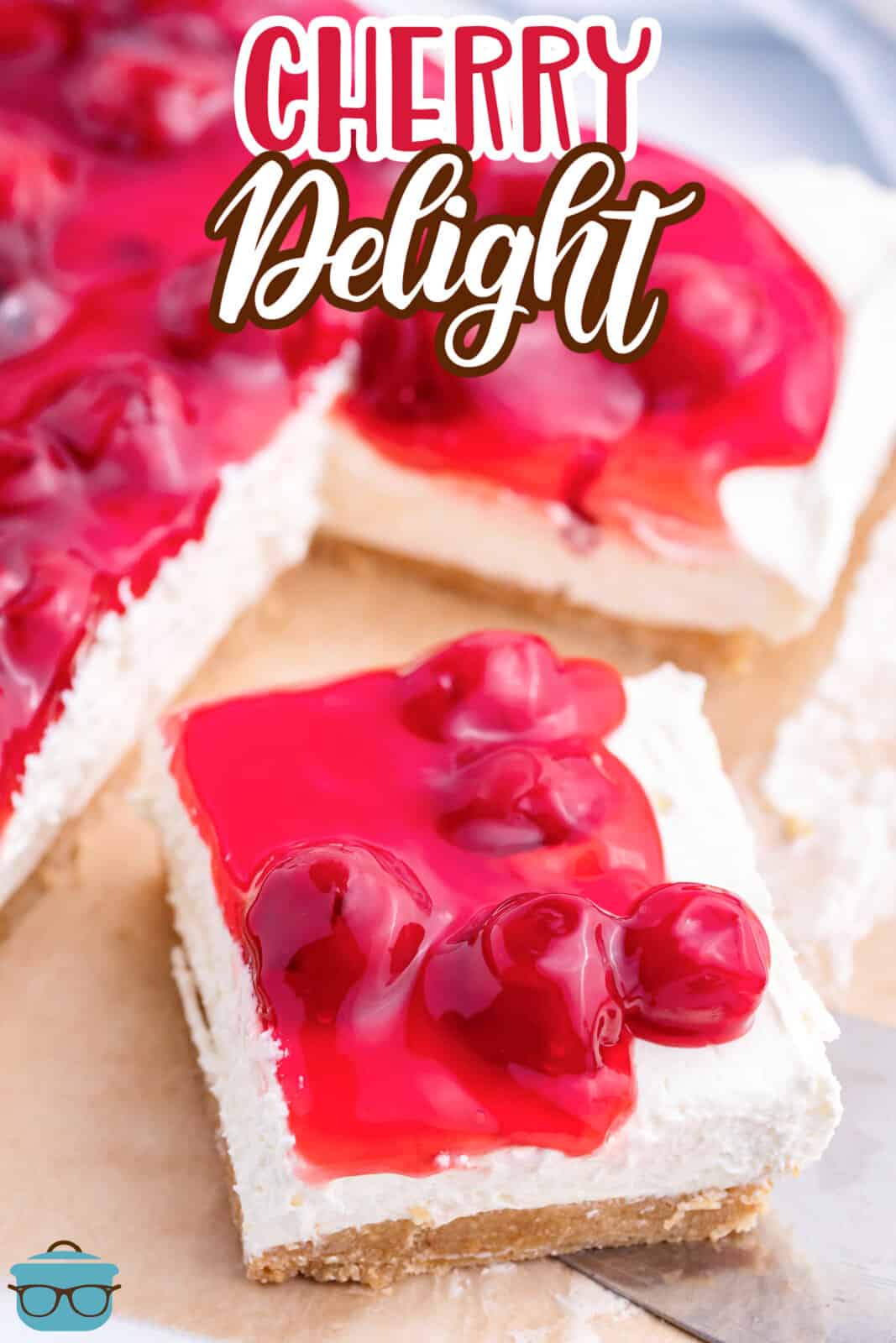 A slice of Cherry Delight pulled away from the rest of the dessert.