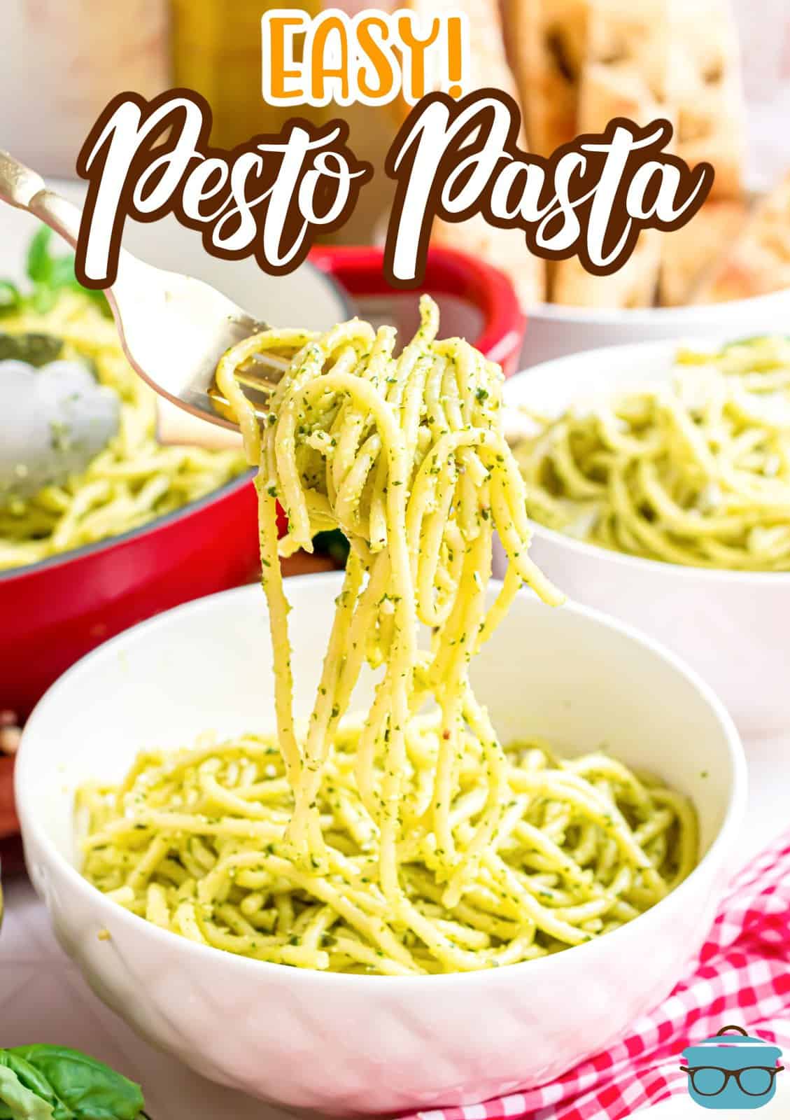 A fork holding a bite of Pesto Pasta.
