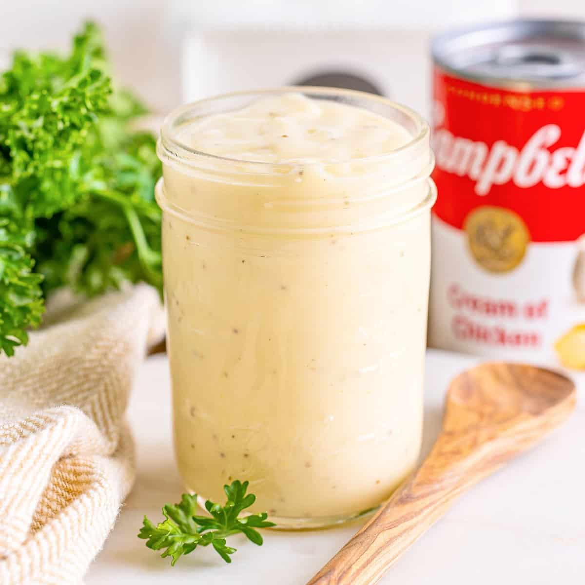 A jar of homemade condensed cream of chicken soup.