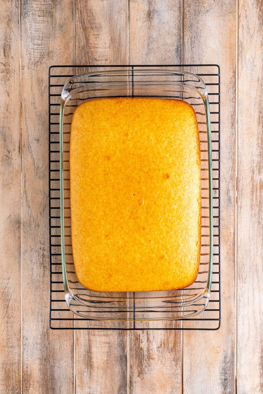 A white cake in a baking dish.