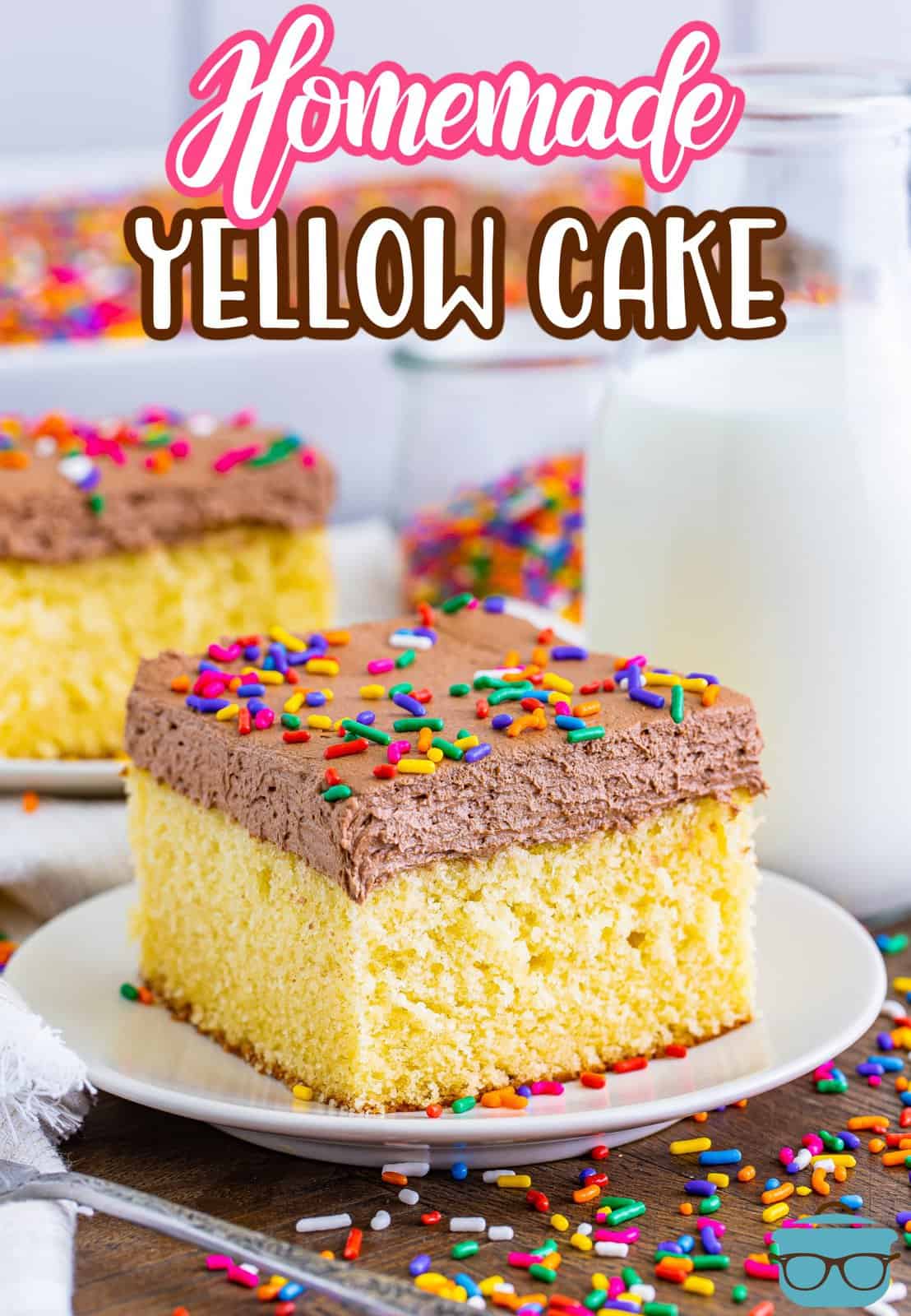 A slice of homemade yellow cake with homemade chocolate frosting.