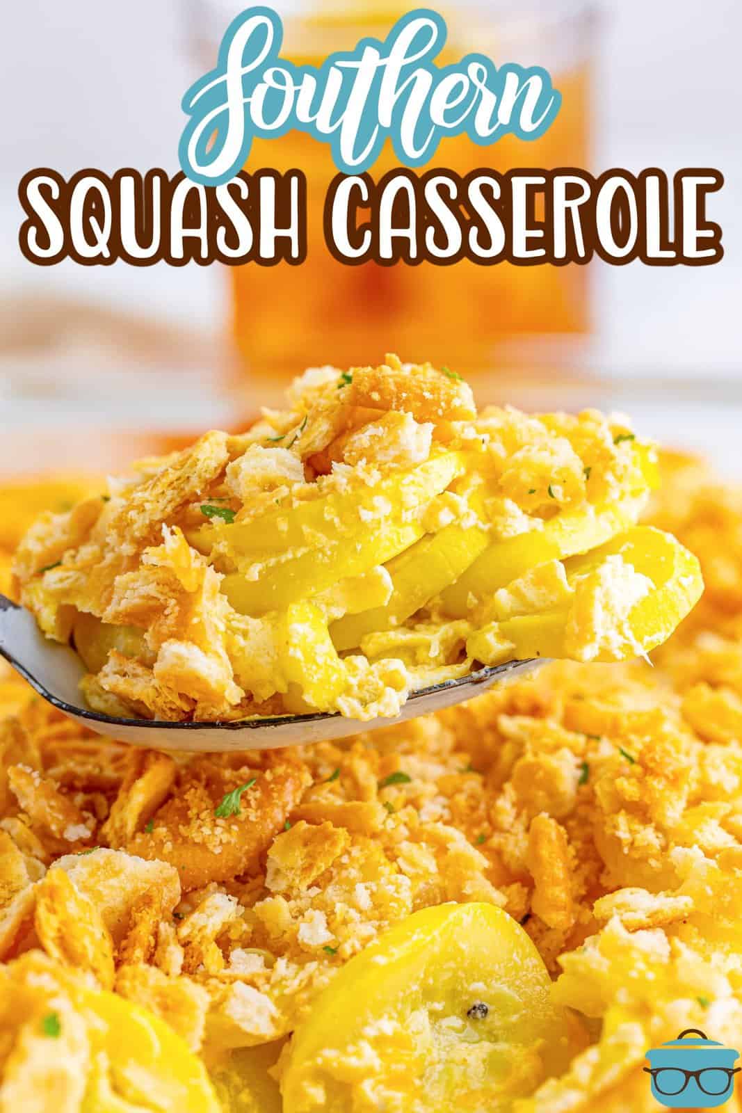 A spoon with a bite of squash casserole.