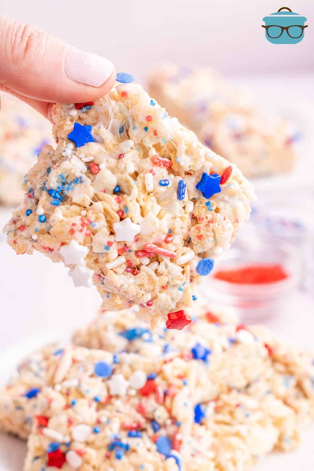 A hand holding a 4th of July Rice Krispies.