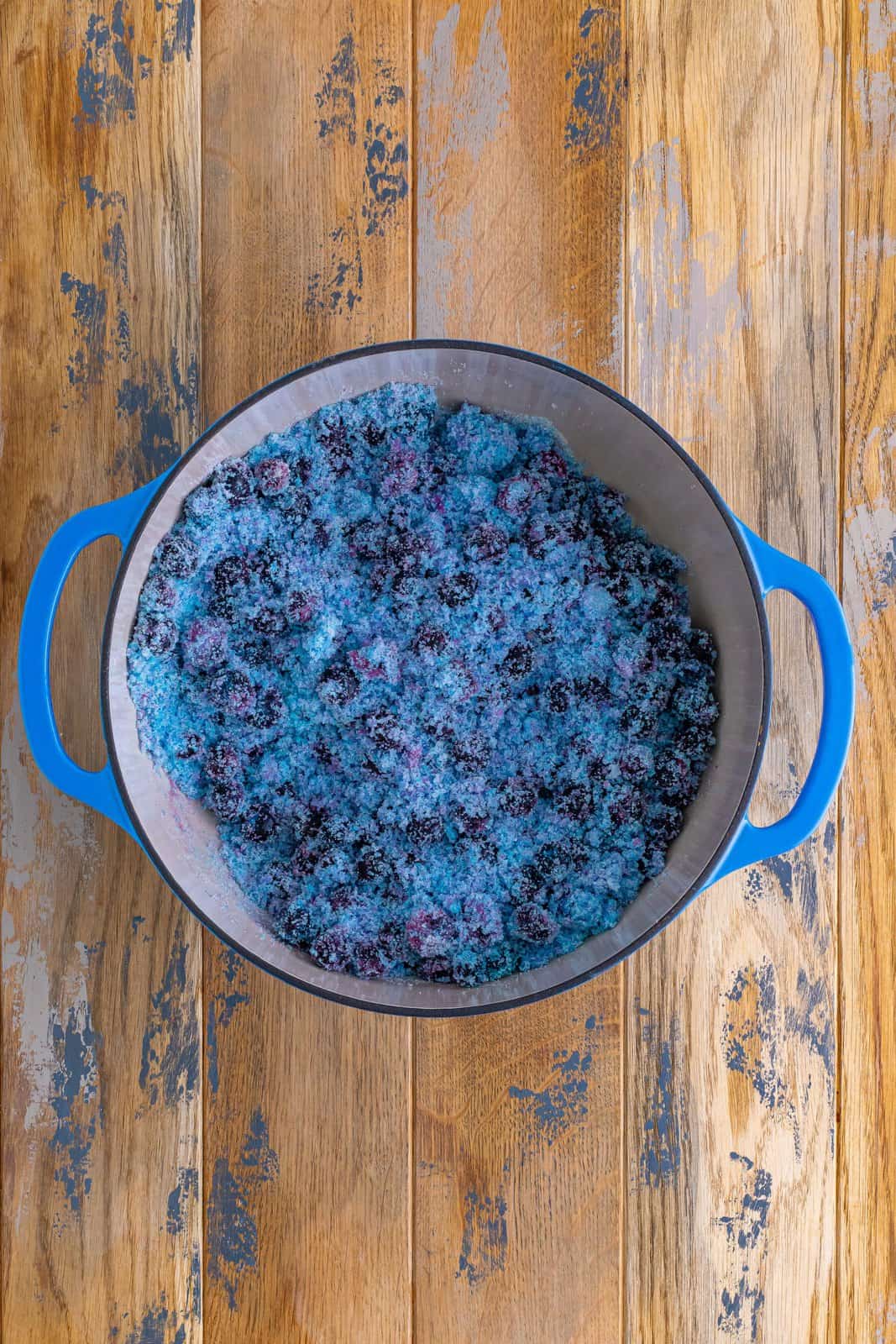 A large pot full of Blueberry Jam that's freshly mixed. 