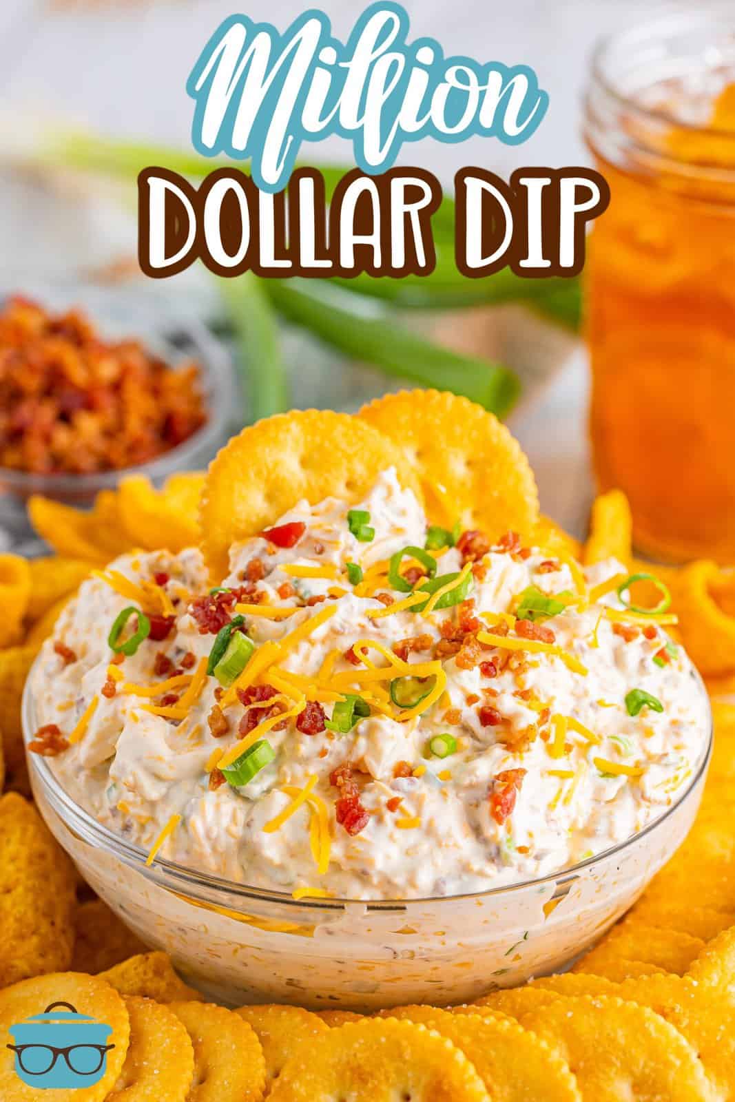 A few crackers in a bowl of Million Dollar Dip.