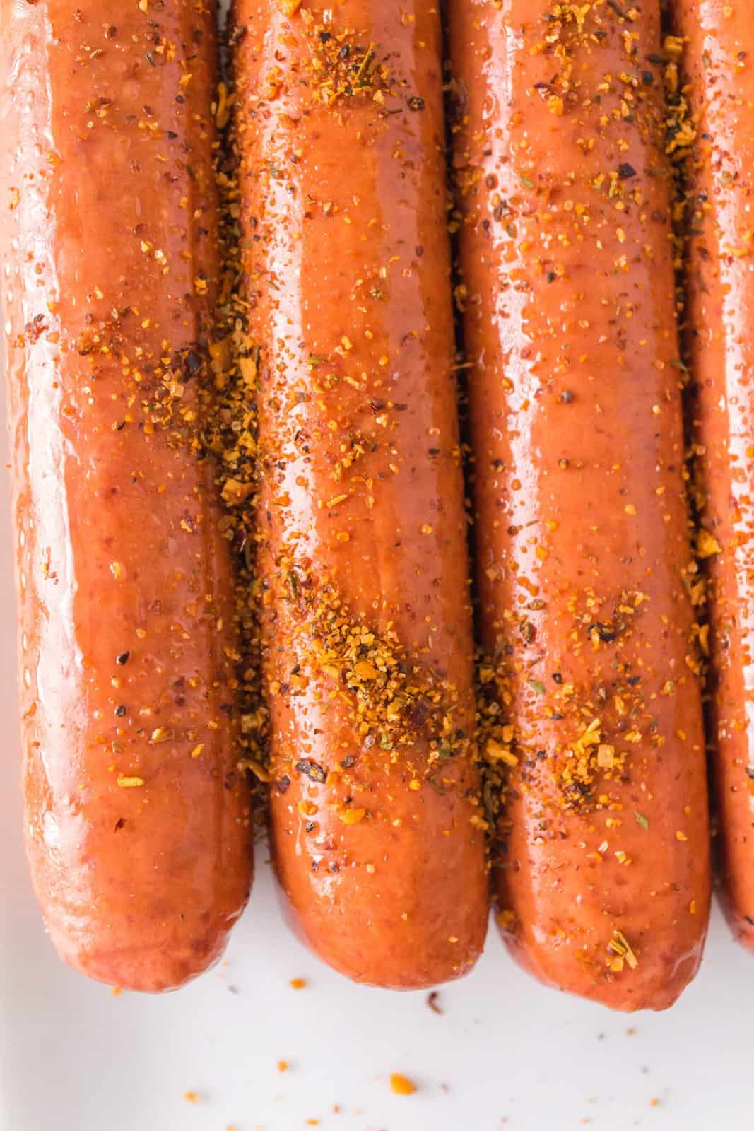 Hot dogs seasoned with oil, seasonings and mustard. 