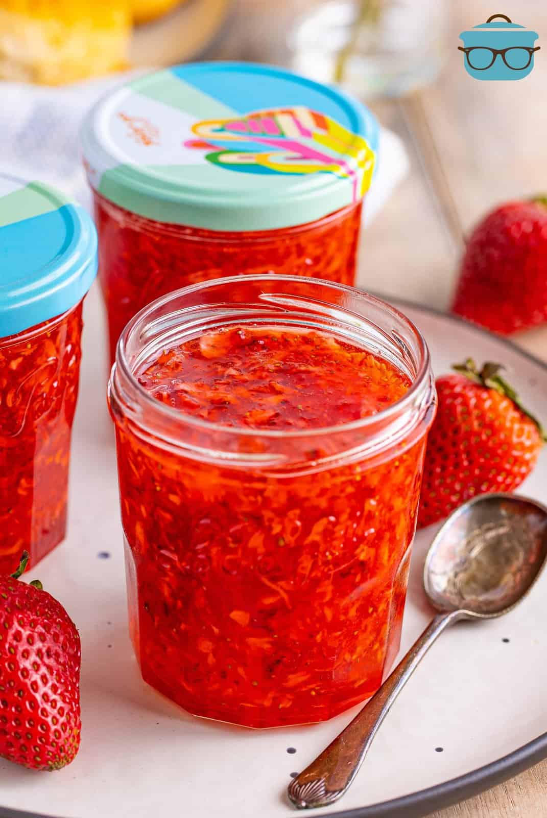 A jar of homemade freezer strawberry jam.