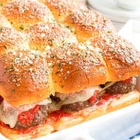 A bunch of meatball sliders all connected by the buns.