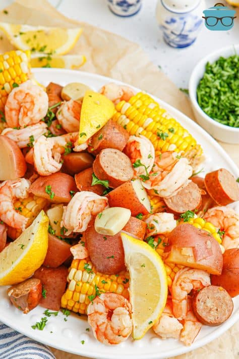 A serving platter with a bunch of Shrimp Boil.