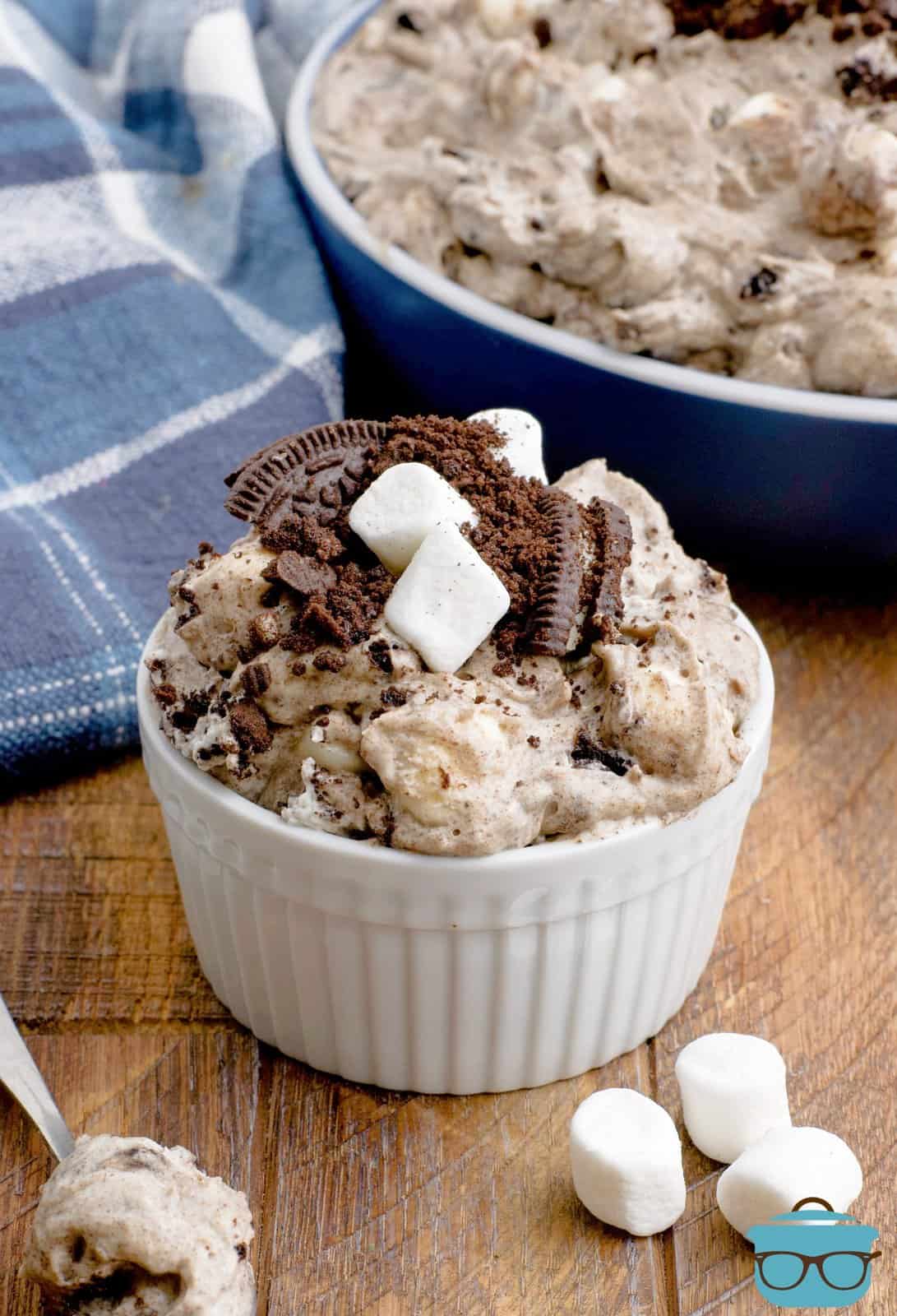 A small bowl of Oreo fluff with marshmallows and oreos. 