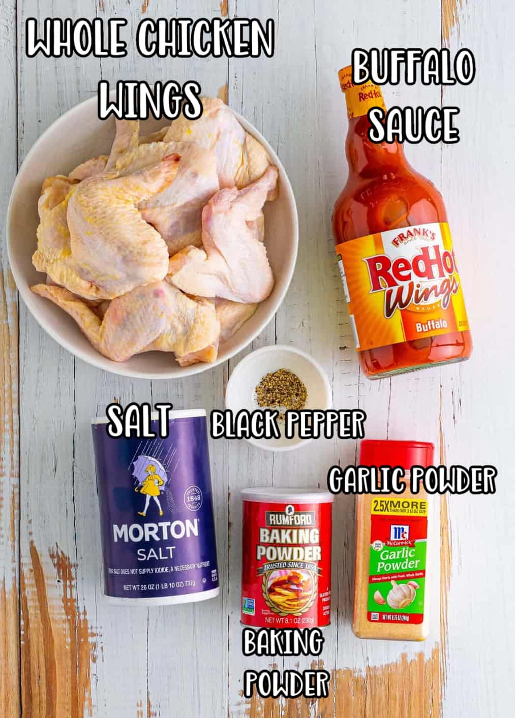 Chicken wings, Frank's Buffalo sauce, salt, pepper, baking powder, and garlic powder. 