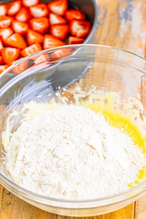 A mixing bowl with the flour mixture and butter mixture.
