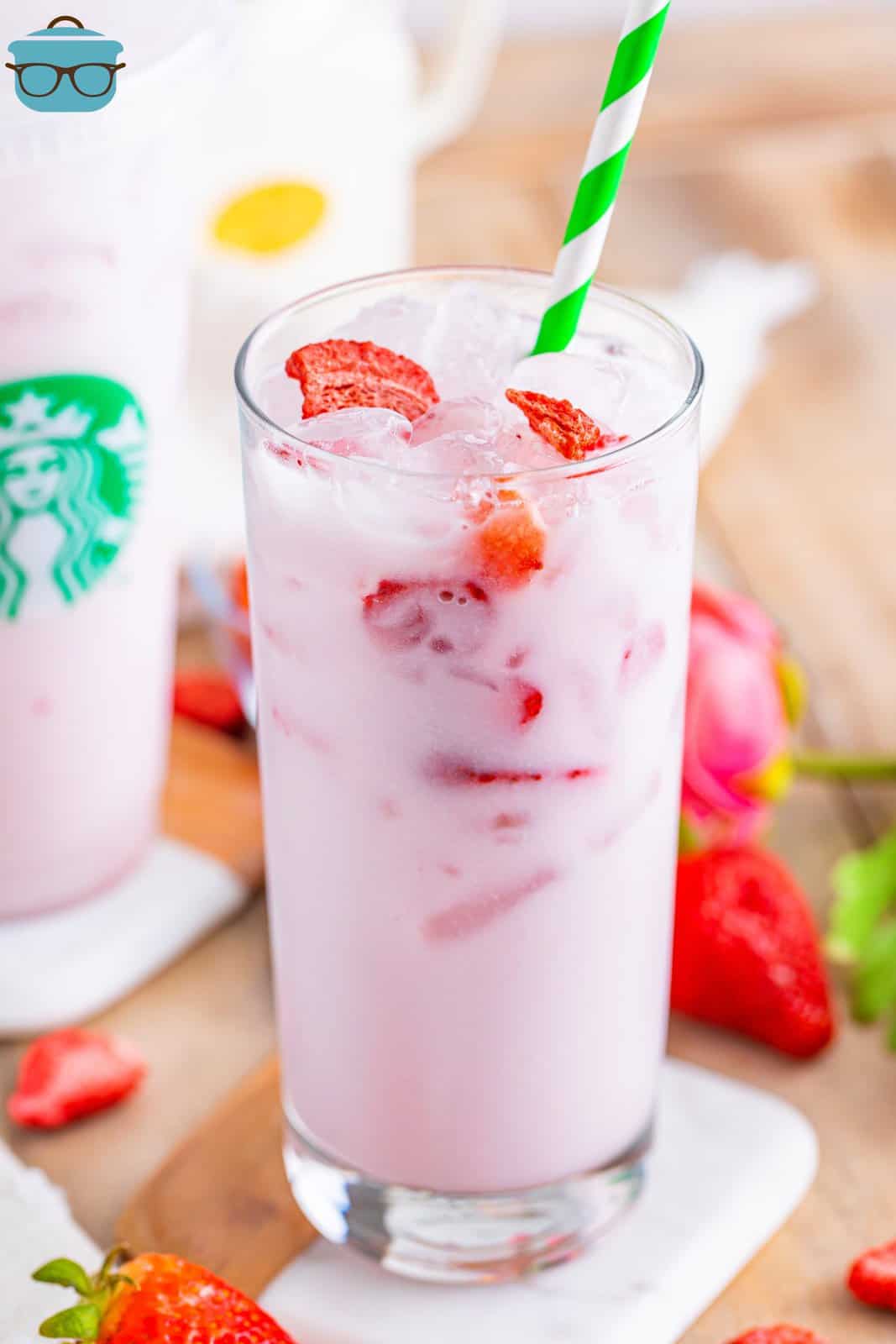 A tall, skinny glass fo Starbucks Pink Drink.