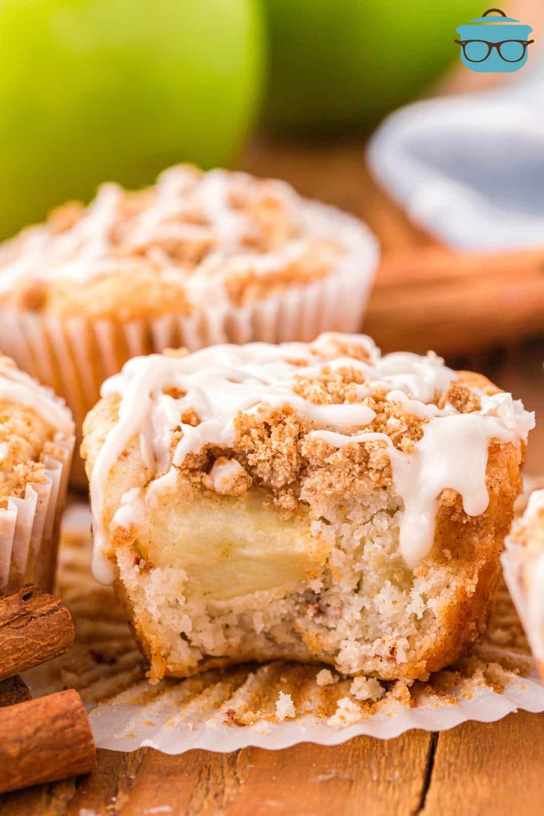 An Apple Streusel Muffin with a bite taken out.