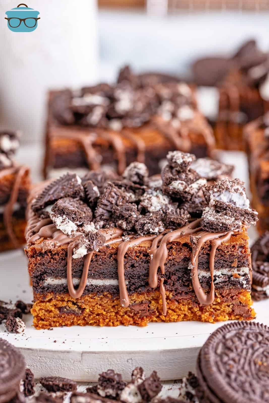 A few Oreo Brookie Bars with chocolate drizzle on top.