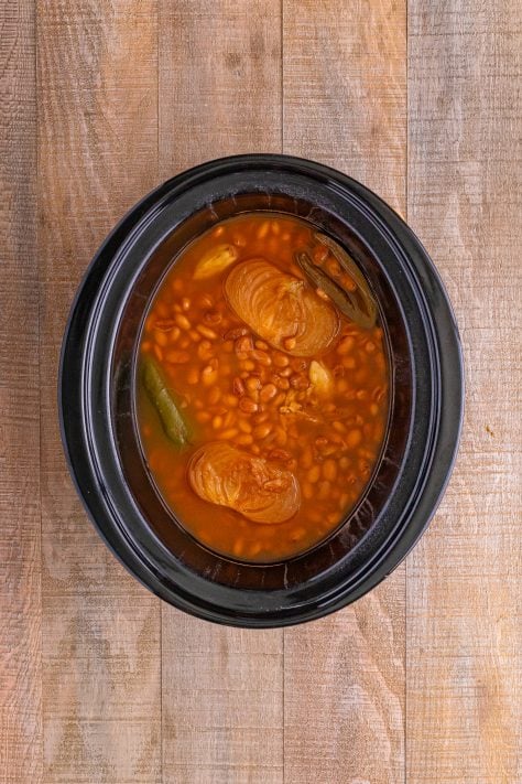 Cooked beans in a slow cooker.