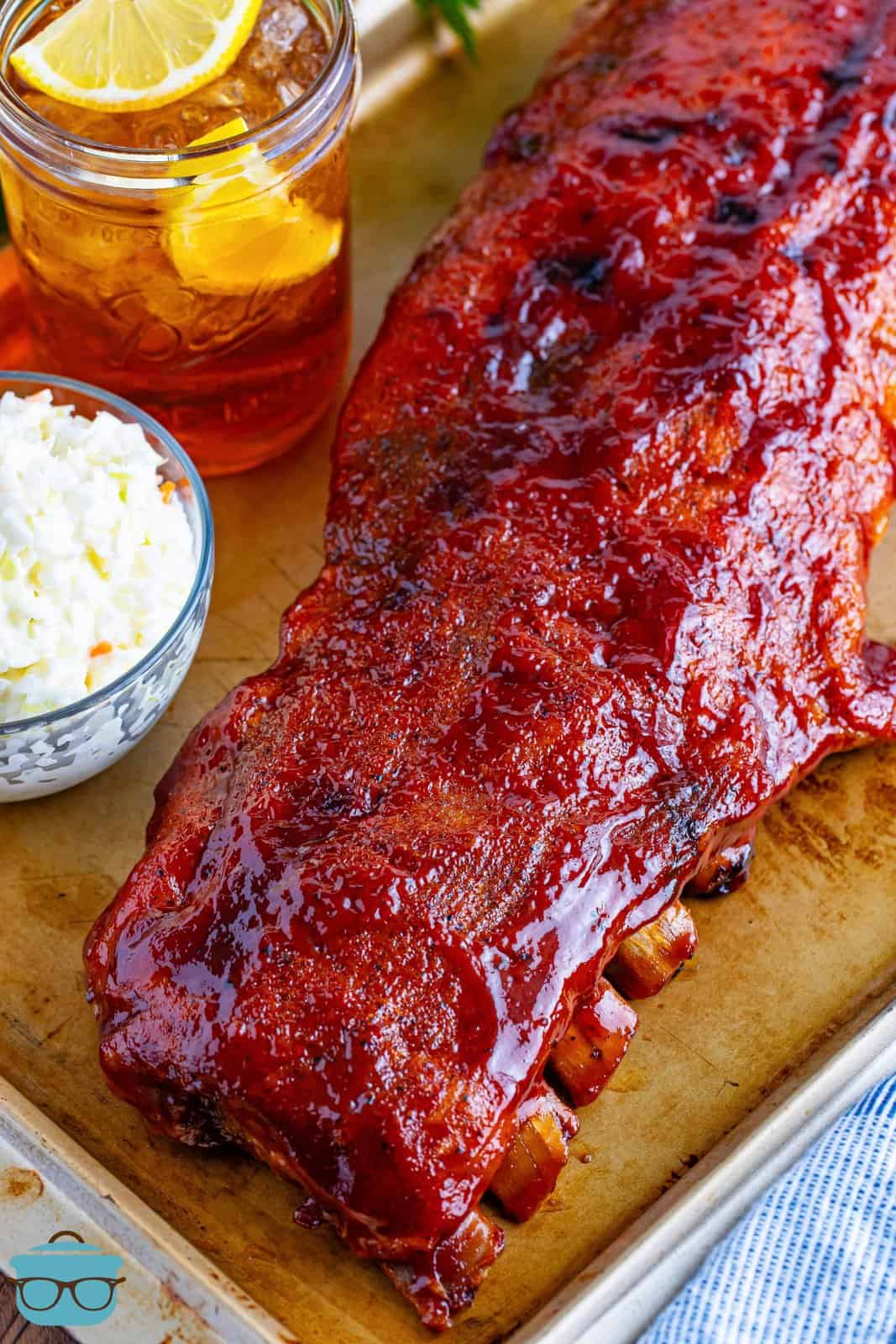 Oven baked ribs on a serving platter.