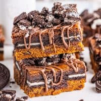 Closely looking at two Oreo Brookie Bars piled on top of each other.
