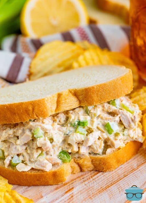 Fresh made Tuna salad on two pieces of sandwich bread.