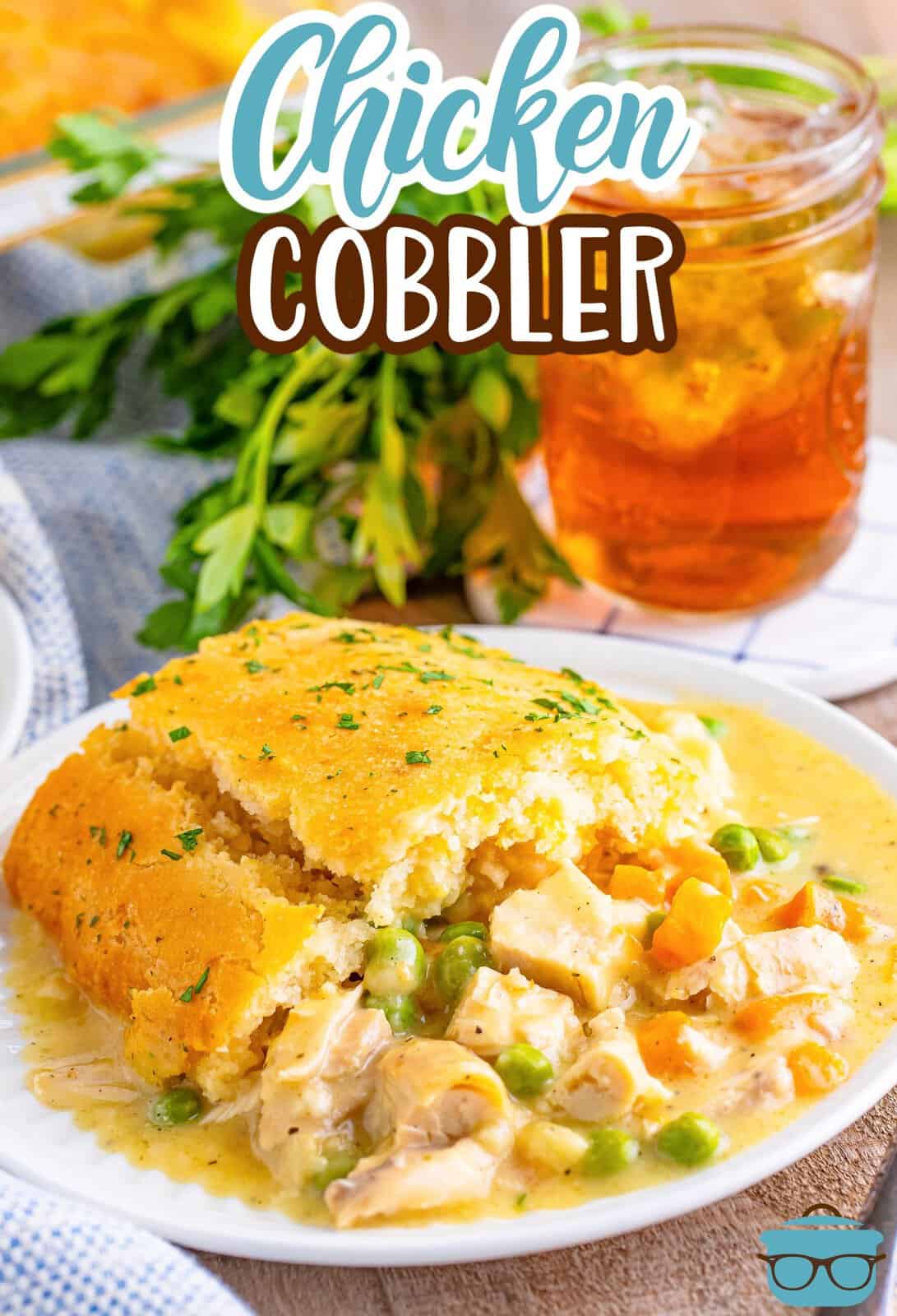 A white plate with a large serving of Chicken Cobbler.