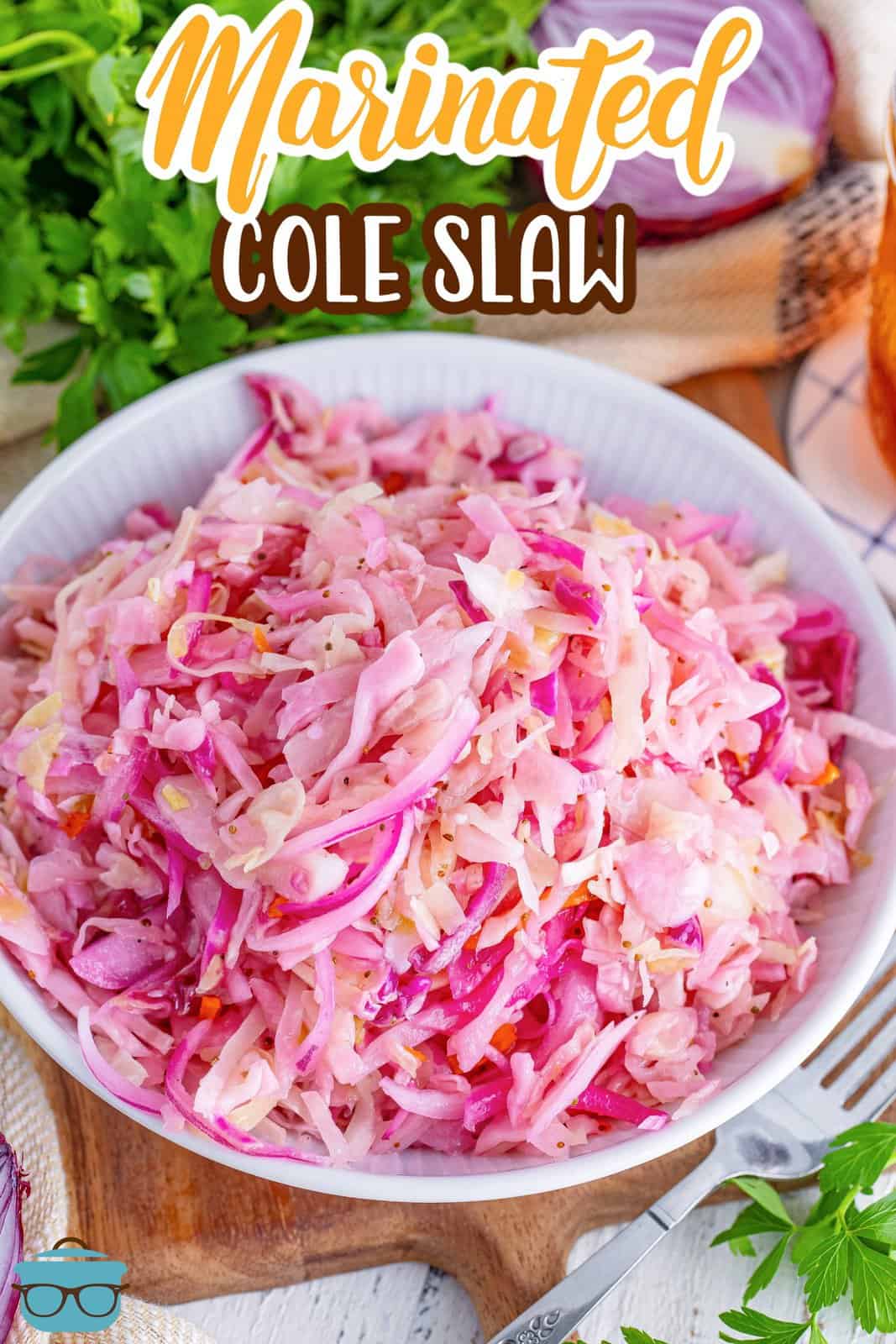 A white bowl of Marinated Cole Slaw.