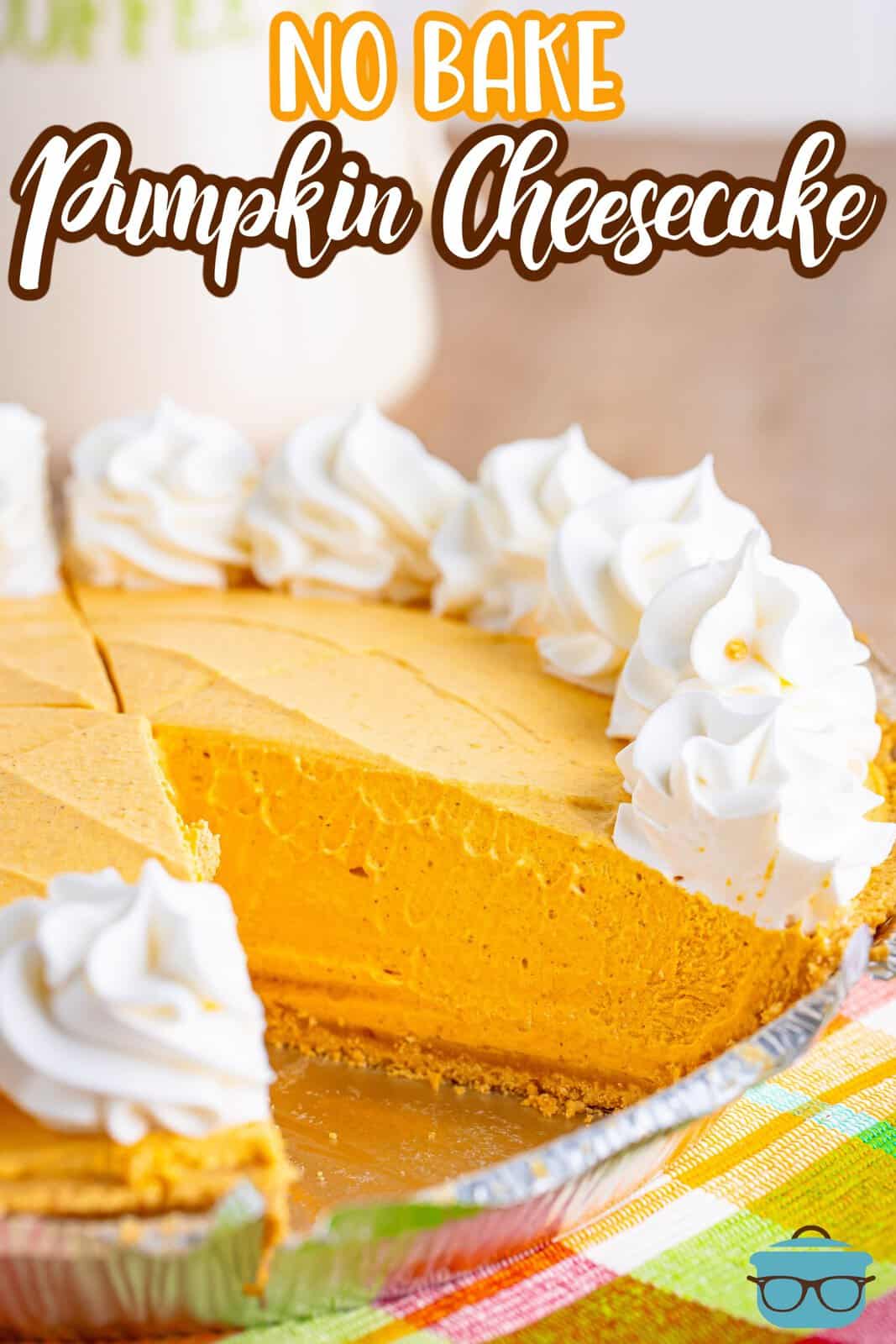 A No Bake Pumpkin Cheesecake with a slice missing.