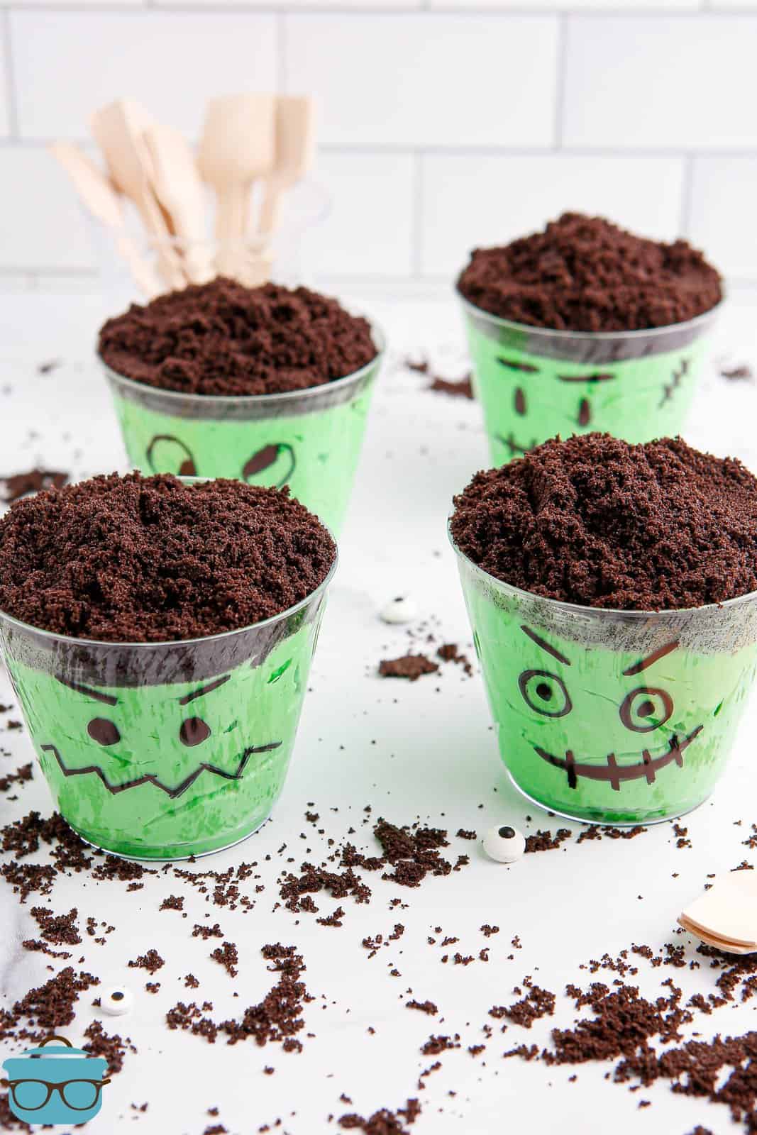 A few clear cups decorated to look like Frankenstein Pudding.