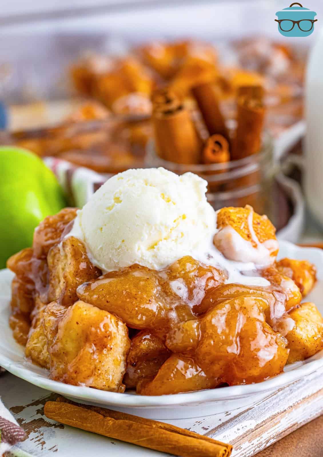 A plate of Apple Pie Bubble Up with a scoop of vanilla ice cream.