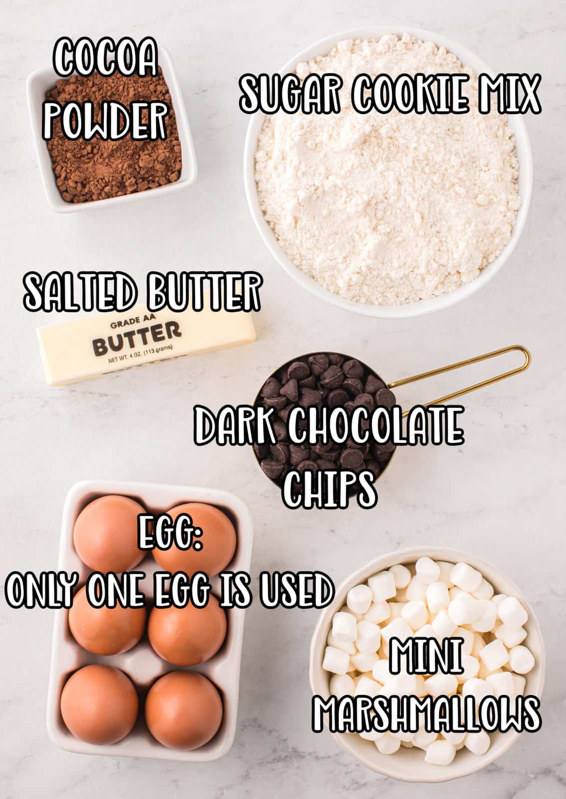Cocoa powder, eggs, mini marshmallows, butter, dark chocolate chips and sugar cookie mix. 