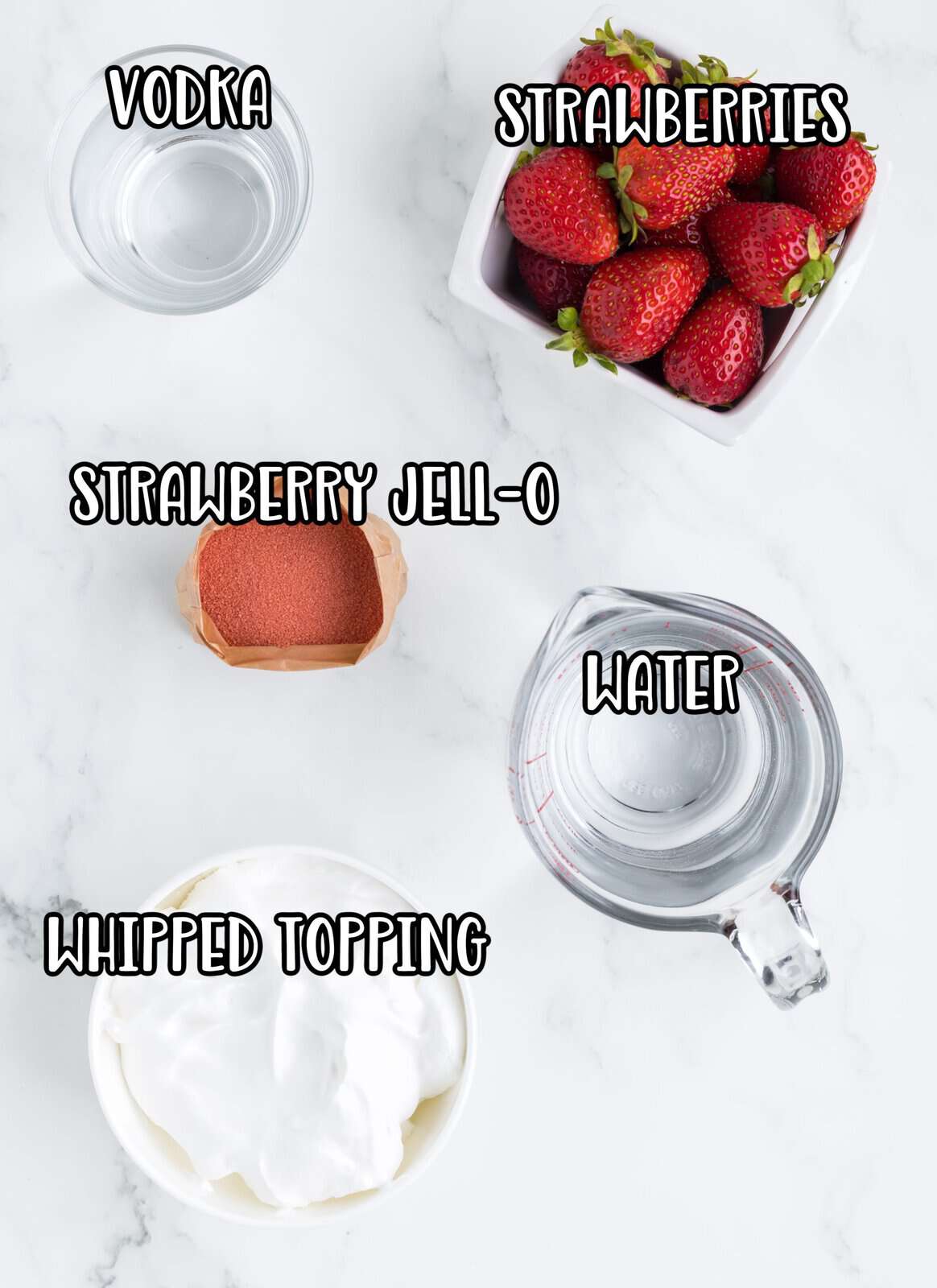 Strawberries, water, strawberry jell-o, whipped topping and vanilla extract.