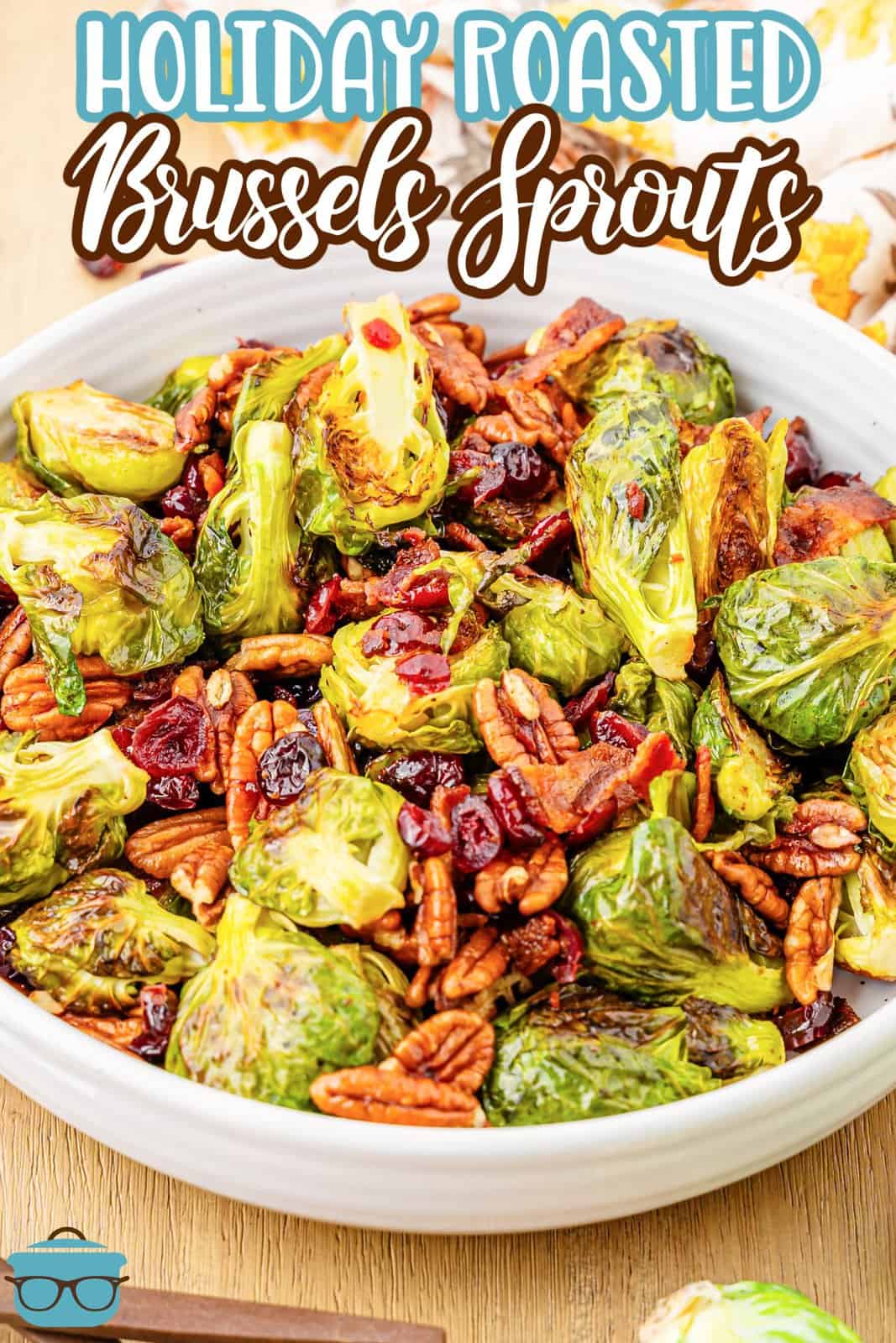 A big white serving platter of Brussels Sprouts.