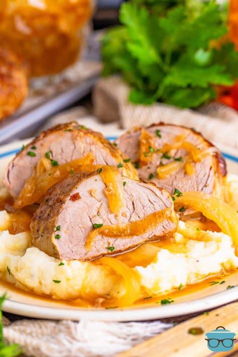 A few slices of the slow cooked Pork Tenderloin on a bed of mashed potatoes.