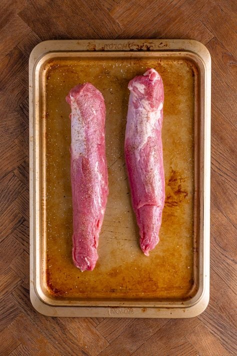 Seasoned Pork Tenderloins on a baking sheet.
