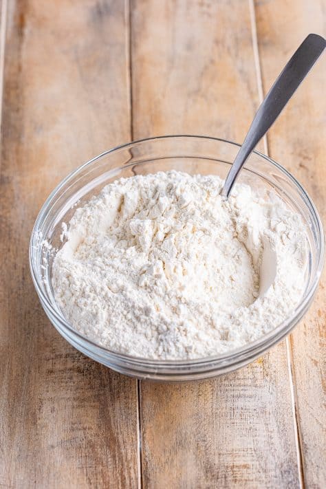 Flour and baking powder in a mixing bowl.