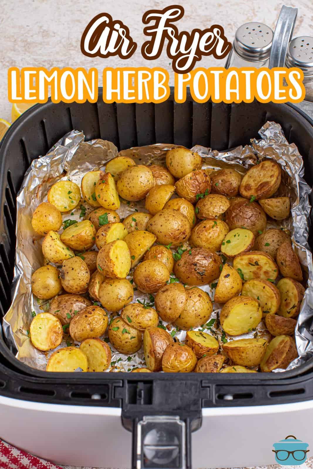 Looking down on Lemon Herb Potatoes in an Air Fryer basket.