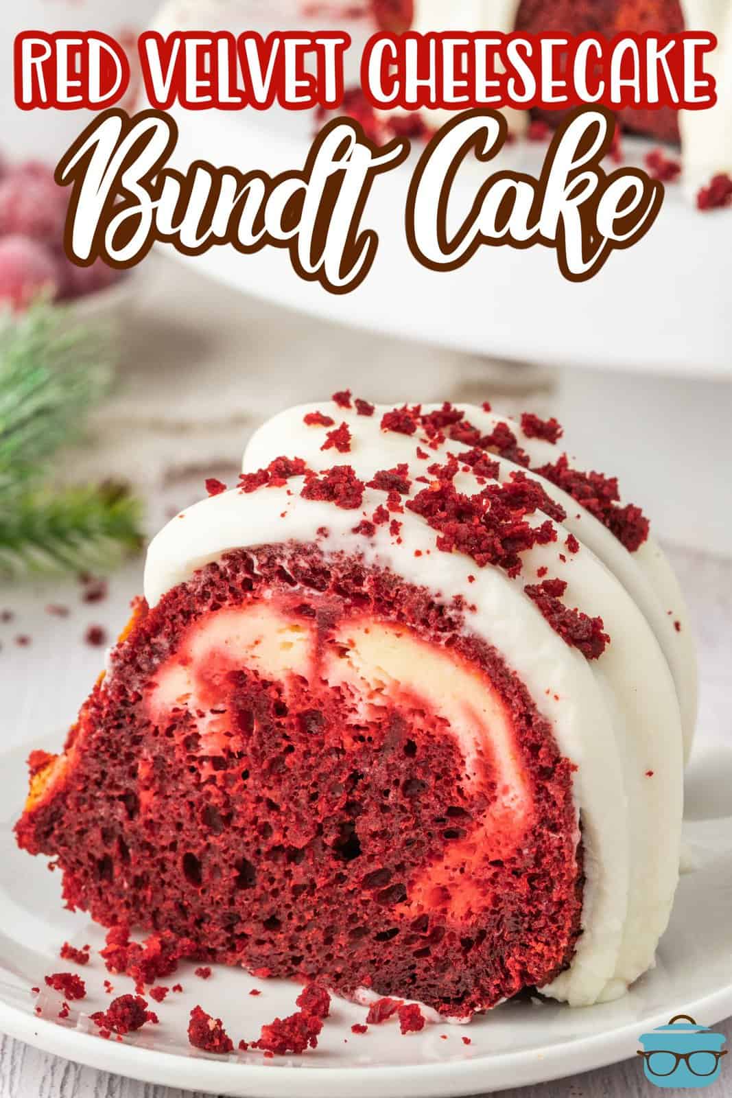 A slice of Red Velvet Cheesecake Bundt Cake with its cream cheese frosting.