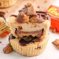 Two Reese's Mini Cheesecakes on top of each other, one broken.