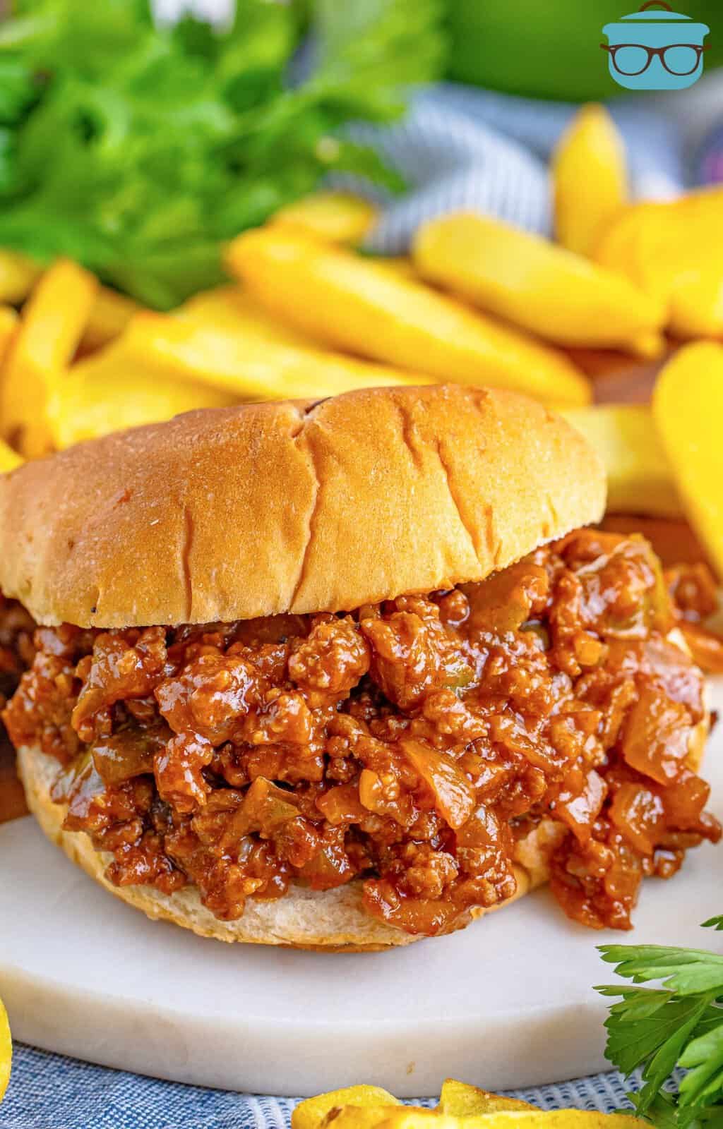 A plate with an overflowing Dr Pepper Sloppy Joe.