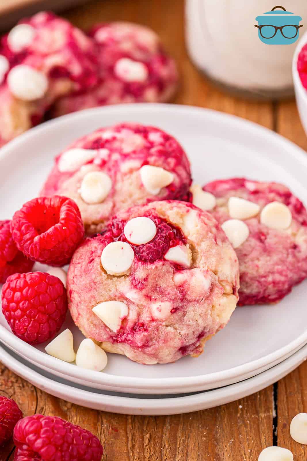 A few Raspberry White Chocolate Cookies on a a white serving plate.